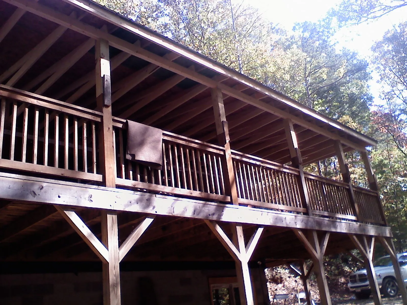 Timber framing under a new elevated porch and deck — Roof Leak Repair in Reesville by Roofing Brothers